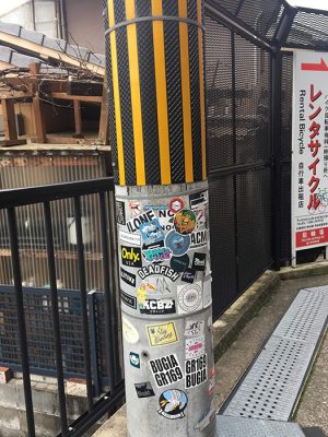 Grapple Shack Sticker stuck to a Lamp Post in Japan